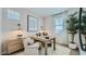 Cozy office space featuring stylish decor, a decorative accent wall, and a comfortable seating area with natural light at 3341 S Lily Ave, Mesa, AZ 85212