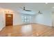 Bright and airy living area with wood floors, plantation shutters and an open floor plan at 3344 N 62Nd Pl, Scottsdale, AZ 85251