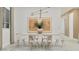Bright dining room features a modern chandelier and bright, neutral paint colors at 3780 E Gold Mountain Ave, San Tan Valley, AZ 85143