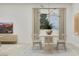 Inviting dining room with stylish chandelier, modern décor, and bright natural lighting at 3780 E Gold Mountain Ave, San Tan Valley, AZ 85143