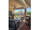 Relaxing covered patio with comfortable seating, a fire pit, and an outdoor dining area for entertaining at 45091 W Gavilan Dr, Maricopa, AZ 85139