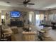 Spacious living room featuring comfortable seating, natural light, and an open layout for easy entertaining at 45091 W Gavilan Dr, Maricopa, AZ 85139