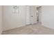 Carpeted bedroom with a closet, an artwork piece, and a view to the bathroom at 4933 E Downing St, Mesa, AZ 85205