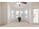 Cozy bedroom featuring a bay window with neighborhood views and exterior access at 4933 E Downing St, Mesa, AZ 85205