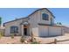 Charming two-story home with decorative desert landscaping and inviting curb appeal at 4933 E Downing St, Mesa, AZ 85205