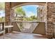 Patio view framed by stone pillars overlooking the residential community at 5450 E Deer Valley Dr # 1211, Phoenix, AZ 85054