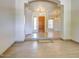 Inviting foyer with wood-look tile flooring and views to living spaces at 694 W Beechnut Dr, Chandler, AZ 85248