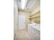 Practical laundry room with washer and dryer, featuring shelving for organized storage and convenience at 694 W Beechnut Dr, Chandler, AZ 85248
