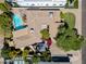 Aerial view showcasing a beautiful pool, landscaped backyard, and the home's roof at 7246 E Virginia Ave, Scottsdale, AZ 85257