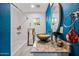 Bathroom featuring modern vanity with granite countertop, stylish mirror, and shower-tub combo at 7246 E Virginia Ave, Scottsdale, AZ 85257