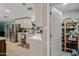 Charming kitchen with bright cabinetry and stainless steel appliances, with pantry access at 7246 E Virginia Ave, Scottsdale, AZ 85257