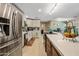 Bright kitchen featuring white cabinetry, stainless steel appliances, and spacious countertops at 7246 E Virginia Ave, Scottsdale, AZ 85257