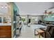 Spacious living room featuring open floor plan with updated floors and ample natural light at 7246 E Virginia Ave, Scottsdale, AZ 85257