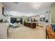 Spacious living space combining the dining area, kitchen, and sitting area at 7246 E Virginia Ave, Scottsdale, AZ 85257