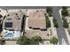 Aerial view of the property featuring a landscaped yard and a pool at 8068 W Carlota Ln, Peoria, AZ 85383