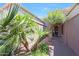 Beautiful front entrance with desert landscaping, a brick walkway, and covered porch at 8541 E Krail St, Scottsdale, AZ 85250