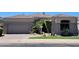 Charming single-story home with a well-manicured front yard and desert landscaping at 8541 E Krail St, Scottsdale, AZ 85250