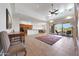 Spacious open-concept living room, kitchen and dining area with access to a covered patio at 8541 E Krail St, Scottsdale, AZ 85250