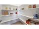 Walk-in pantry with extensive shelving, providing ample storage space for food and household items at 8541 E Krail St, Scottsdale, AZ 85250