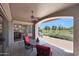 Covered patio area with chairs and beautiful views of the golf course at 8541 E Krail St, Scottsdale, AZ 85250