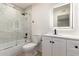 Updated bathroom with new shower, new vanity and tile flooring at 9645 W Kimberly Way, Peoria, AZ 85382