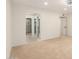 Spacious bedroom with neutral carpet and an ensuite bathroom with tile flooring at 9645 W Kimberly Way, Peoria, AZ 85382