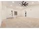 Open living room featuring neutral color palette, large fan, and recessed lighting at 9645 W Kimberly Way, Peoria, AZ 85382
