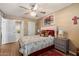 Serene bedroom with hardwood floors, neutral walls, and soft, comfortable bedding at 9666 W Mountain View Rd # A, Peoria, AZ 85345
