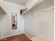 Walk-in closet with a long shelf and white walls at 9666 W Mountain View Rd # A, Peoria, AZ 85345