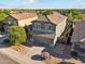 Two-story house with a well-maintained lawn and desert landscaping at 10252 E Butherus Dr, Scottsdale, AZ 85255