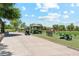 Picturesque golf course setting with a golf cart, practice area, and beautiful scenery at 10252 E Butherus Dr, Scottsdale, AZ 85255