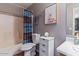 Cozy bathroom with a shower-tub combo, vanity, and tiled floors at 1057 E Silversmith Trl, San Tan Valley, AZ 85143