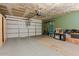 The expansive garage features plenty of room for parking, storage, and hobbies at 1057 E Silversmith Trl, San Tan Valley, AZ 85143