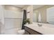 Well-maintained bathroom featuring modern fixtures, a bathtub with shower, and a clean aesthetic at 11982 E Primrose Ln, Florence, AZ 85132
