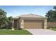 Charming single-story home with a two-car garage and well-maintained landscaping at 11982 E Primrose Ln, Florence, AZ 85132