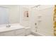 Clean bathroom featuring sleek fixtures, white tiles, and modern finishes providing a refreshing experience at 12438 E Verbina Ln, Florence, AZ 85132