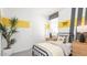 Playful bedroom featuring themed decorations, stylish furnishings, and ample natural light for a cheerful atmosphere at 12438 E Verbina Ln, Florence, AZ 85132