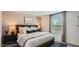 Serene bedroom offers a relaxing retreat with soft textures and a calming color palette at 12469 E Verbina Ln, Florence, AZ 85132