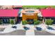 Aerial view of community pool with a splash pad and seating area for residents at 12469 E Verbina Ln, Florence, AZ 85132