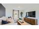 Bright living room boasts modern decor and stylish furnishings for comfortable living at 12469 E Verbina Ln, Florence, AZ 85132
