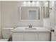 Bathroom featuring modern fixtures, a bright mirror, and a sleek, clean design at 12935 E Mercer Ln, Scottsdale, AZ 85259
