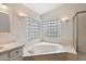 This modern bathroom features a large soaking tub, a walk-in shower, and and sinks at 12935 E Mercer Ln, Scottsdale, AZ 85259