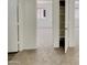 Bedroom featuring carpet floors, a storage closet, and an abundance of natural light at 13030 W Hearn Rd, El Mirage, AZ 85335