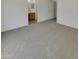 Spacious bedroom featuring neutral carpet and ample natural light at 13030 W Hearn Rd, El Mirage, AZ 85335