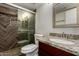 The bathroom has a granite vanity and beautifully tiled shower with glass doors at 154 W 5Th St # 210, Tempe, AZ 85281