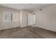 Bright carpeted bedroom featuring large windows and ample natural light at 154 W 5Th St # 210, Tempe, AZ 85281