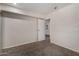 Carpeted bedroom featuring a doorway to additional space at 154 W 5Th St # 210, Tempe, AZ 85281