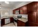 Well-equipped kitchen with granite countertops, and modern appliances at 154 W 5Th St # 210, Tempe, AZ 85281