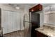 This kitchen features stainless steel appliances, wood style flooring, and ample storage at 154 W 5Th St # 210, Tempe, AZ 85281