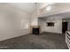 Inviting living room showcases a decorative stone fireplace and an open-concept layout at 154 W 5Th St # 210, Tempe, AZ 85281